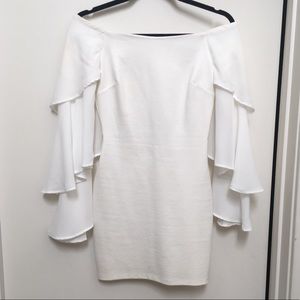 Off the shoulder white dress with ruffle sleeves